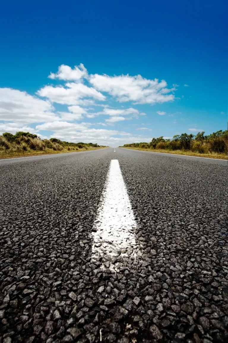 Open road asphalt and blue sky